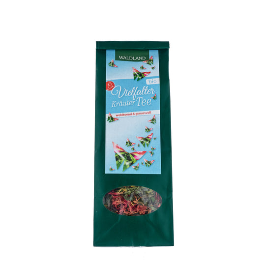 Waldland Bio Vielfaltertee. Bio Kräutertee in grüner Verpackung mit Sichtfenster.